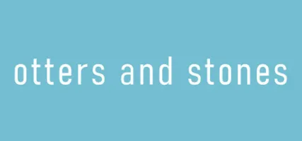 otters and stones
